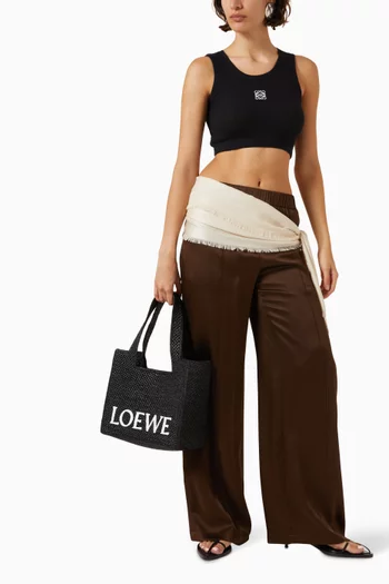 حقيبة يد متوسطة بشعار الماركة خوص