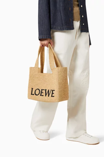 حقيبة يد متوسطة بشعار الماركة خوص