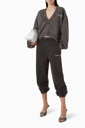 سويت شيرت فضفاض بفتحة رقبة V صوف ناعم