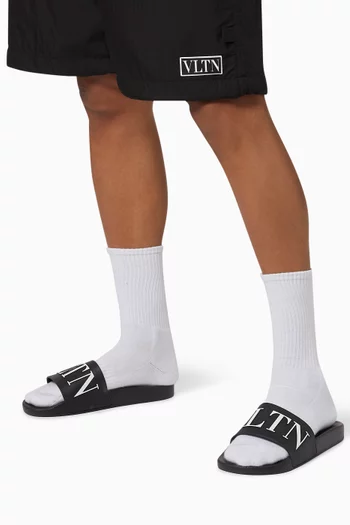 حذاء مفتوح فالنتينو غارافاني بشعار الماركة