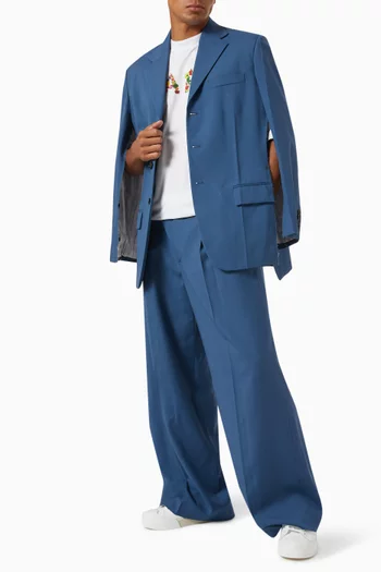 جاكيت مطرز يدويًا بشعار الماركة صوف وموهير