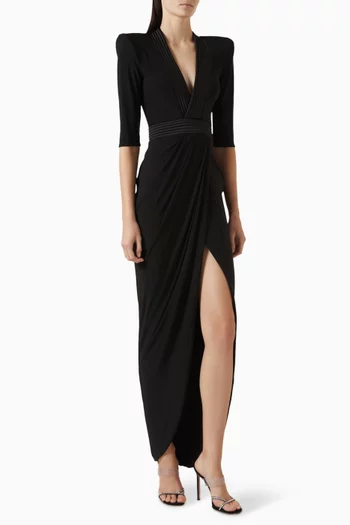 EYE OF HORUS GOWN- FULLY LINED STRETCH JERSEY GOWN WITH PLUNGE NECKLINE STITCHED SATIN FEATURE, SHOULDER ACCENTS AND WRAP STYLE SKIRT:BLK:4|217412011