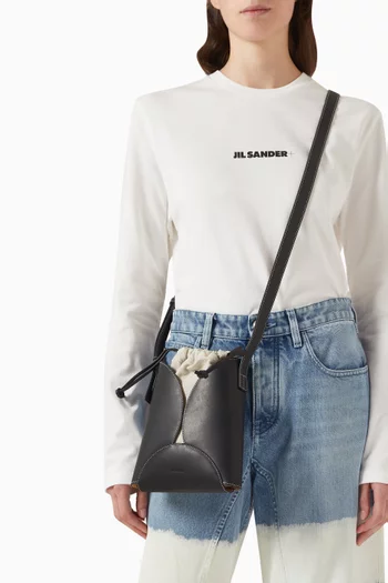 Curve Crossbody Bucket Bag in Leather