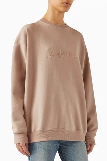 Buy SAINT LAURENT Pink Embossed Logo Sweatshirt in Cotton fleece For Women Online Ounass Saudi