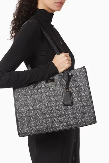 حقيبة يد كبيرة قنب مغلف بنقشة زهور بالشكل البستوني