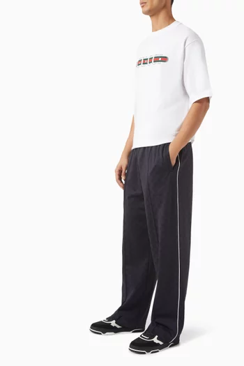 بنطال بنقشة شعار حرفي GG قطن ونايلون