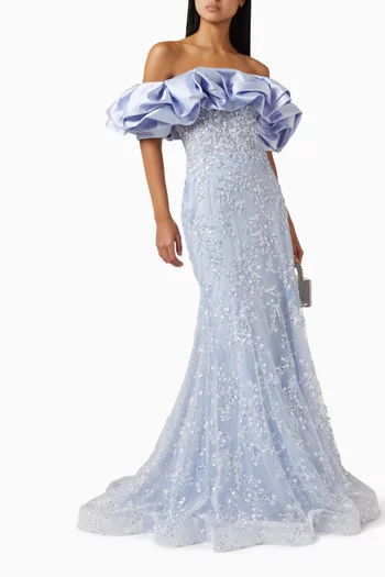 فستان سهرة بأكتاف مكشوفة وتطريزات بالخرز