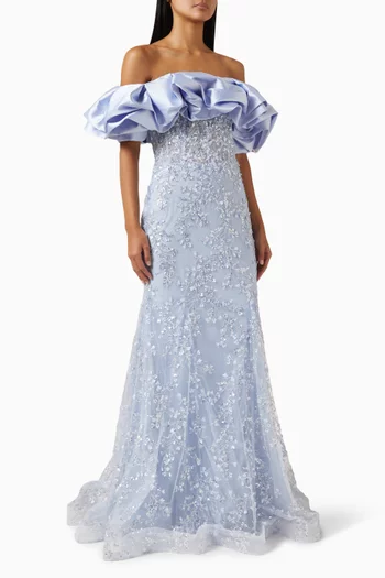 فستان سهرة بأكتاف مكشوفة وتطريزات بالخرز