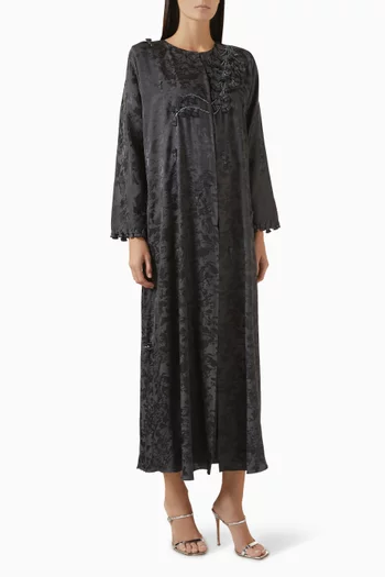 عباية بشرّابات شكل جرس مطرزة بالخرز جاكار