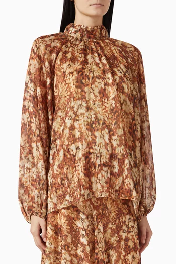 بلوزة مزينة بنقشة