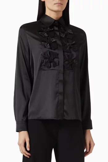 قميص مزين بزهور بارزة