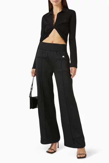 قميص قصير بياقة بولو وعقدة ملفوفة نسيج بيكيه