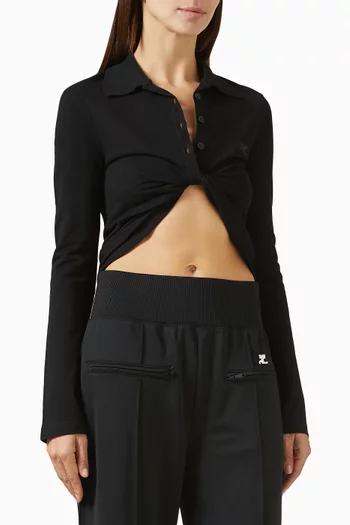 قميص قصير بياقة بولو وعقدة ملفوفة نسيج بيكيه