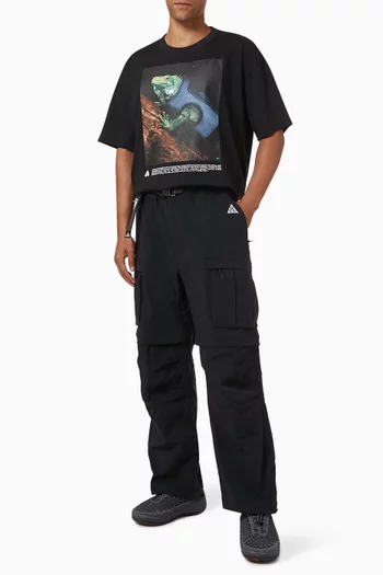 تي شيرت بتقنية Dri-FIT وطبعة إيجوانا من مجموعة ايه سي جي