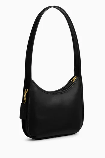 حقيبة بتصميم مقوس بسحاب جلد