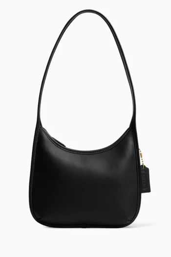 حقيبة بتصميم مقوس بسحاب جلد