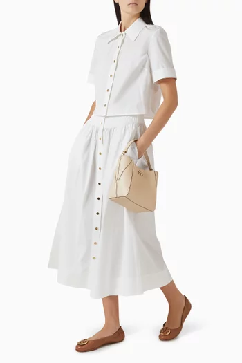 تنورة متوسطة الطول بأزرار قطن بوبلين