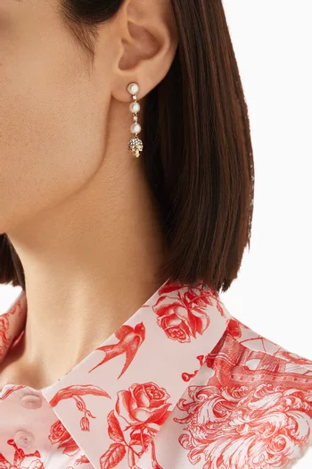 أقراط متدلية بلؤلؤ وجمجمة معدن مطلي بلون ذهبي