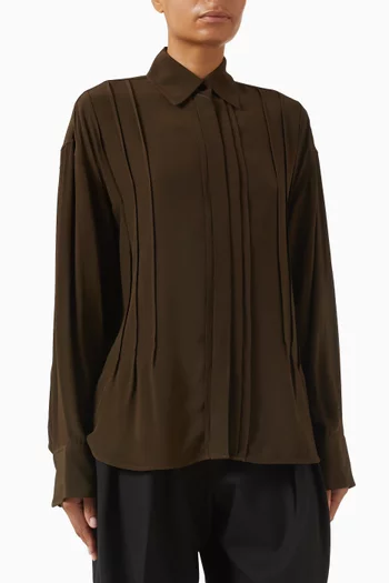 بلوزة بطيات محاكة