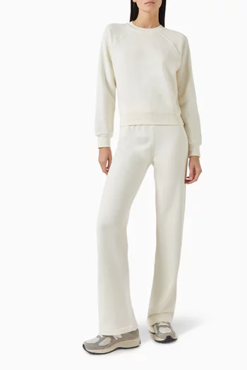 سويت شيرت بقصة قصيرة قليلاً وأكمام رغلان فرنش تيري