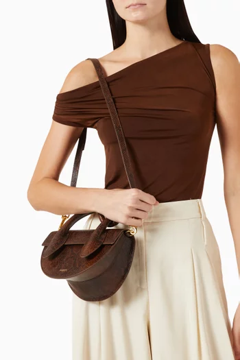 حقيبة كروس بريتزل جلد بقر بنقشة جلد الأفعى