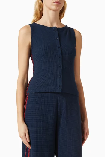 بلوزة بيتسي بأزرار بلا أكمام نسيج متشابك