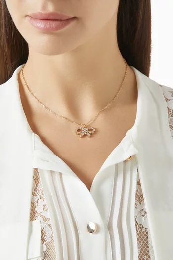 Micro Bow Necklace in Gold-plated Brass