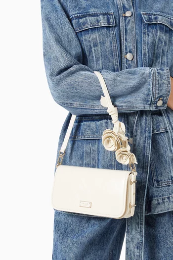 حقيبة كتف ليف بزهور بارزة جلد