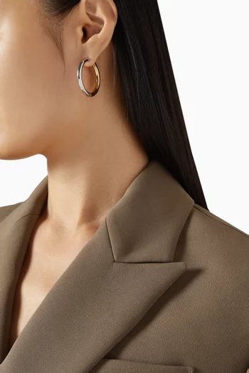 أقراط دائرية بتصميم متداخل نحاس مطلي بلون فضي وذهبي