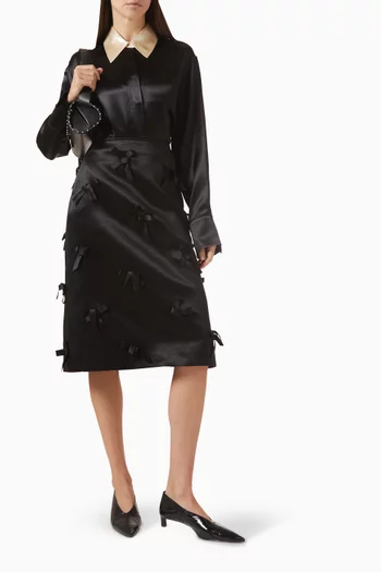 تنورة متوسطة الطول بعقد