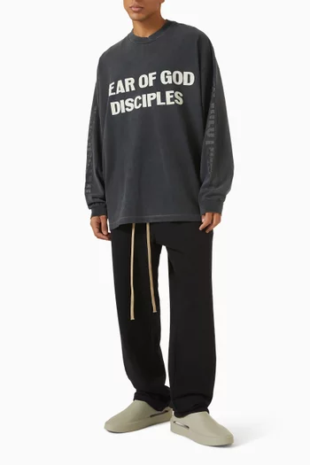 تي شيرت بطبعة عبارة Disciple وقصة فضفاضة قطن