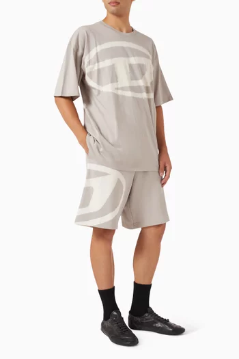 شورت بشعار الماركة بلون باهت قطن عضوي