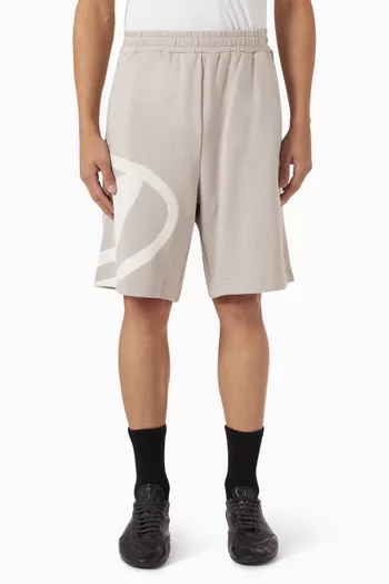 شورت بشعار الماركة بلون باهت قطن عضوي