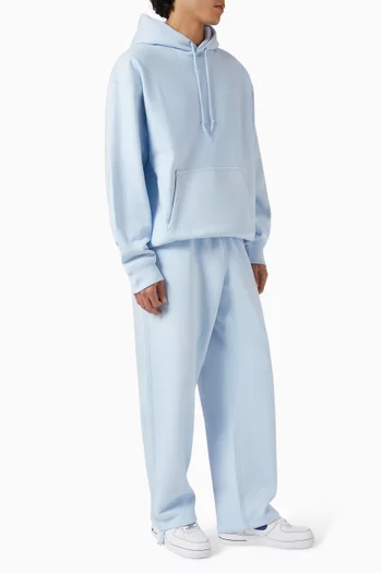 بنطال بشعار سولو وحافة مفتوحة صوف