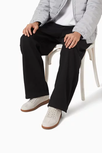 سنيكرز أسفل الكاحل بنعل كابسول وأربطة شمواه