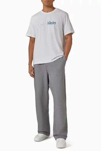 تي شيرت بشعار الماركة بخط يدوي قطن جيرسيه