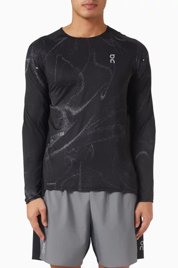 تي شيرت بيرفورمانس-تي بأكمام طويلة قماش عاكس وتقنية DryTec™‎