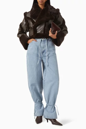 بنطال جينز فاي بقصة واسعة ورباط تضييق دينم