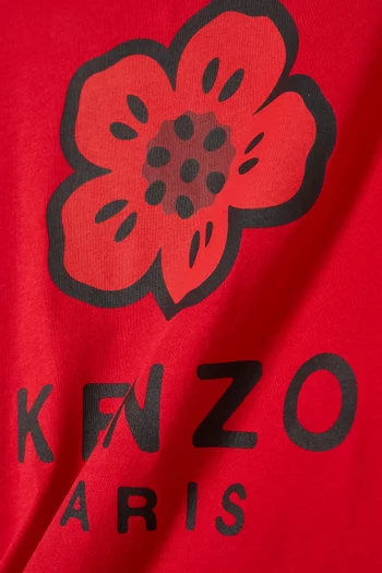 تي شيرت بطبعة شعار الماركة وزهرة قطن