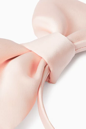 طوق رأس مزين بعقدة بتصميم أوريغامي