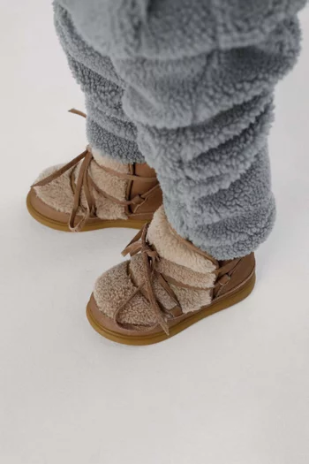 حذاء بوت سيزا فرو صناعي وجلد نوبوك