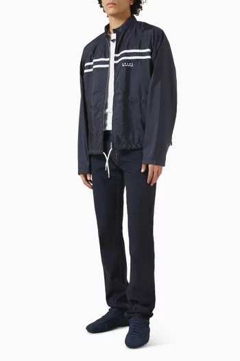 بنطال جينز بقصة تضيق باتجاه الحافة دينم مطاطي