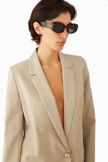 نظارة شمسية بشعار الماركة وإطار دائري أسيتات