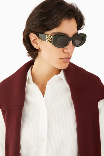 نظارة شمسية بشعار الماركة وإطار دائري أسيتات