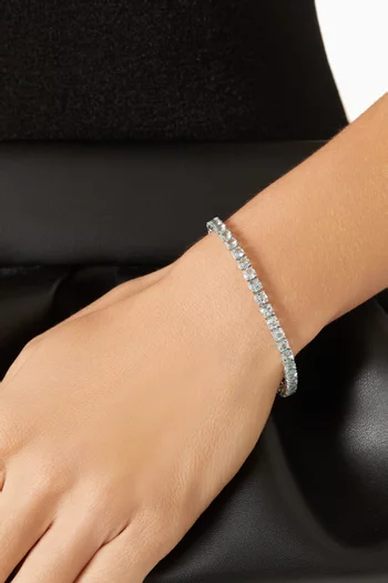 سوار تنس مرصع بأحجار أكوامارين ذهب أبيض عيار 18