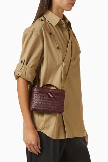 حقيبة مستحضرات تجميل صغيرة جلد مجدول