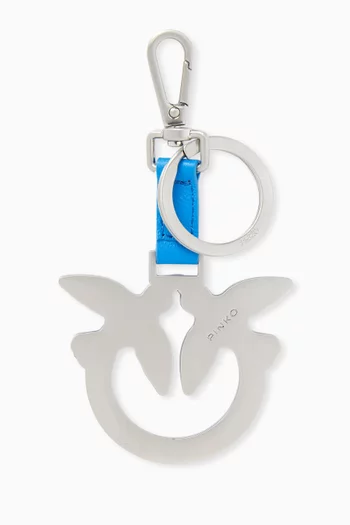 حلقة مفاتيح بشعار الماركة جلد