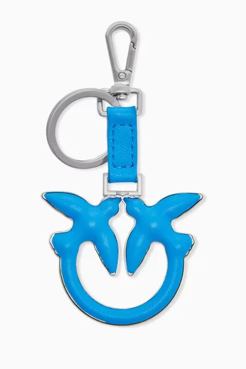 حلقة مفاتيح بشعار الماركة جلد