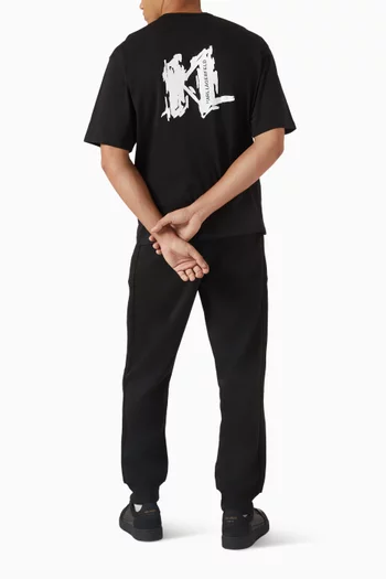 تي شيرت فضفاض بطبعة حرفي KL