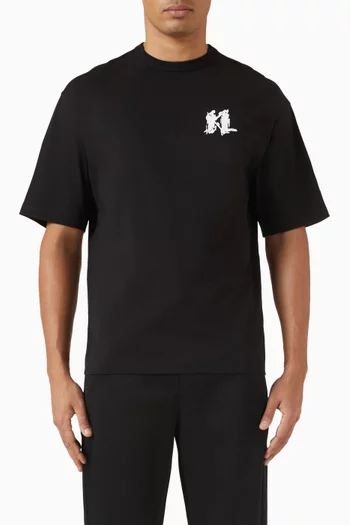 تي شيرت فضفاض بطبعة حرفي KL